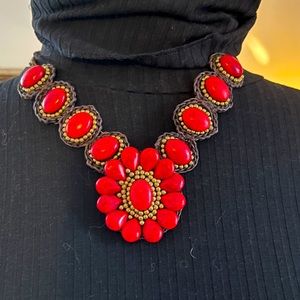 African art necklace with red stone and gold bead accent: